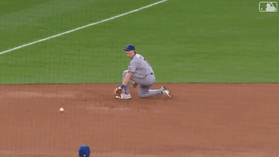 A New York Mets Pitcher Is Throwing A Baseball GIF