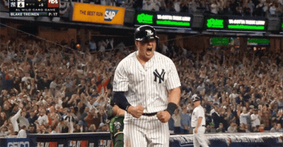 A New York Yankees Baseball Player Celebrates His Home Run GIF
