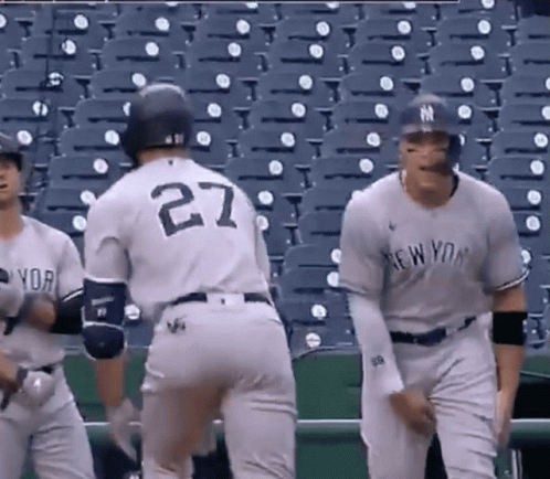 A New York Yankees Baseball Player Wearing Number 27 GIF