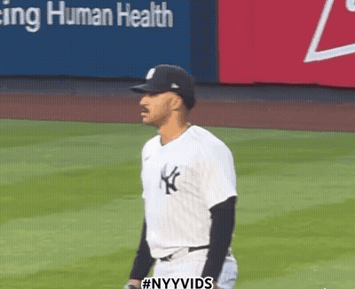 A New York Yankees Player Stands On The Field GIF