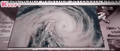 A Newspaper With A Picture Of A Hurricane And The Headline " Launches Weather Satellite Insat " GIF