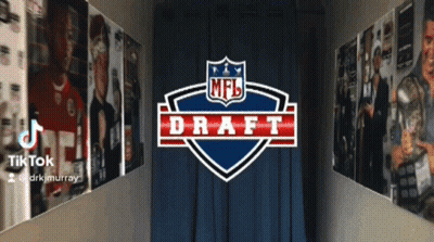 A Nfl Draft Logo Is Displayed On A Wall GIF