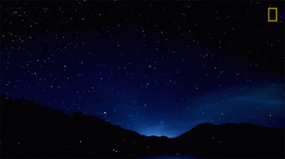 A Night Sky With A Shooting Star And A National Geographic Logo GIF