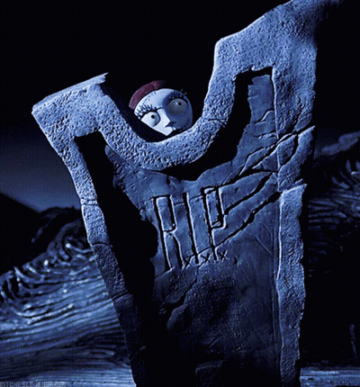 A Nightmare Before Christmas Scene With Sally On A Tombstone GIF