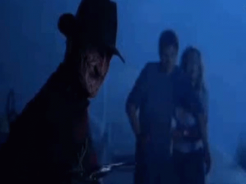 A Nightmare On Elm Street Poster With Freddy Krueger In The Background GIF