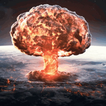 A Nuclear Explosion With A Mushroom Cloud Coming Out Of The Ground GIF