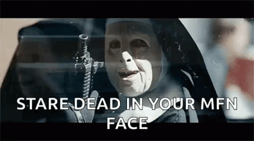 A Nun Is Holding A Gun In Her Hand And Says `` Stare Dead In Your Mfn Face '' GIF