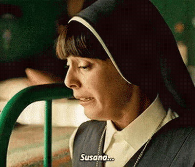 A Nun Is Sitting In A Hospital Bed With A Green Railing And Crying . GIF