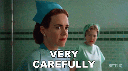 A Nurse Says " Very Carefully " While Another Nurse Looks On GIF