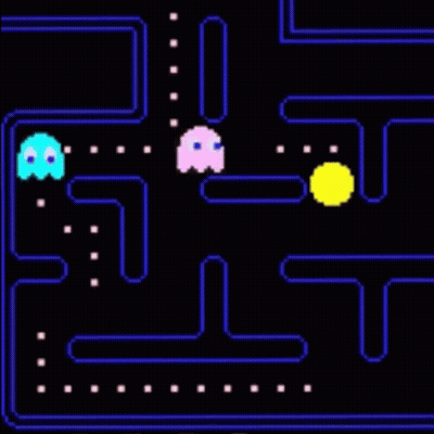 A Pac Man Game With Ghosts And A Ball GIF