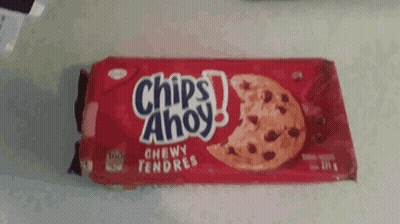 A Package Of Chips Ahoy Chewy Tenders Cookies With A Bite Taken Out Of One GIF