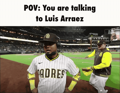 A Padres Baseball Player Talking To Luis Arraez On The Field GIF