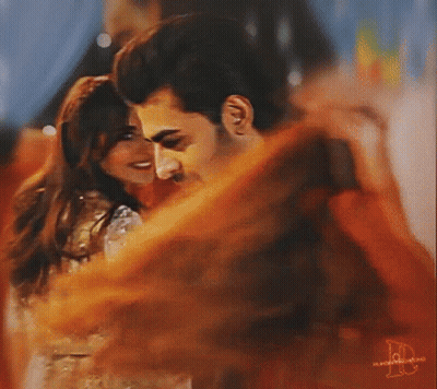 A Painting Of A Man And Woman Hugging With The Letter D On The Bottom Left GIF