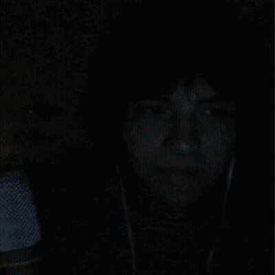 A Painting Of A Man In A Helmet With A Necklace Around His Neck GIF