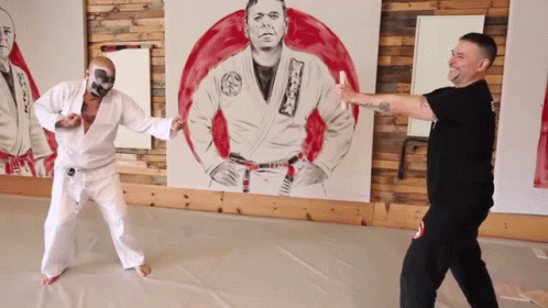 A Painting Of A Man In A Karate Uniform With A Belt That Says ' Karate ' On It GIF