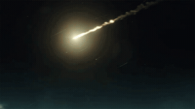 A Painting Of A Mountain With A Shooting Star In The Distance GIF