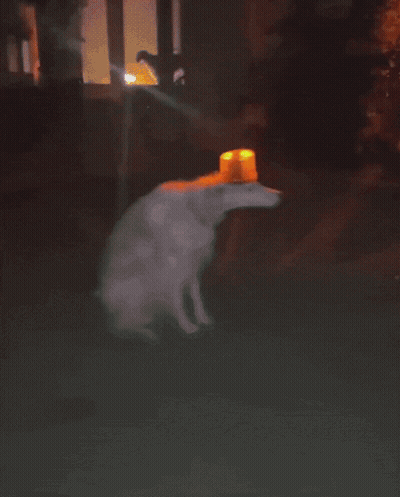 A Painting Of A Sheep With Its Mouth Open And A Red Light On Its Head GIF