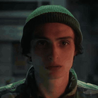 A Painting Of A Soldier Wearing A Helmet And Looking At The Camera GIF