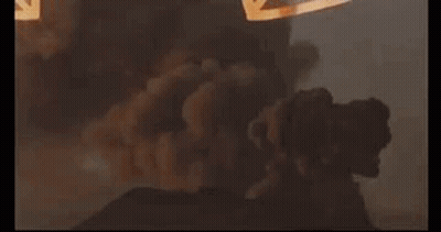 A Painting Of A Volcano Erupting With Smoke Coming Out Of It GIF