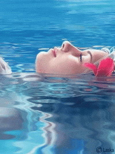 A Painting Of A Woman Floating In The Water With A Flower In Her Hair By Laska GIF