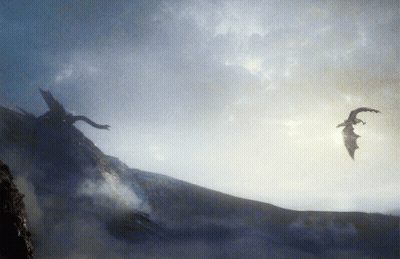 A Painting Of Two Dragons Flying Over A Mountain GIF