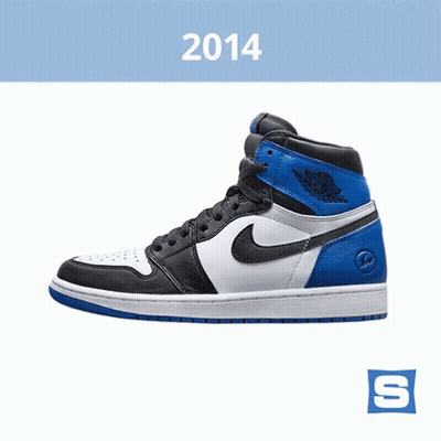 A Pair Of Black And White Nike Shoes With The Year 2014 On The Bottom GIF