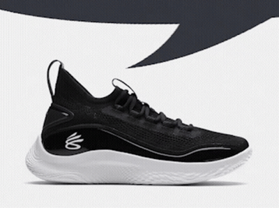 A Pair Of Black And White Under Armour Basketball Shoes GIF