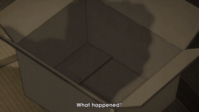 A Pair Of Converse Shoes Sit In A Box GIF
