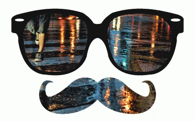 A Pair Of Glasses And A Mustache With A Reflection Of A City GIF