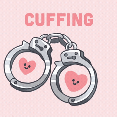 A Pair Of Handcuffs With Pink Hearts And The Word Cuffing GIF