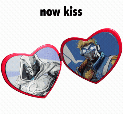 A Pair Of Heart Shaped Glasses With A Picture Of A Man And The Words Now Kiss GIF