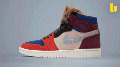 A Pair Of Nike Air Jordans With A Furry Collar GIF