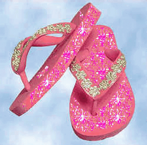 A Pair Of Pink Flip Flops With Glitter And Rhinestones On Them . GIF