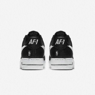 A Pair Of Red And White Nike Air Force 1 Shoes GIF