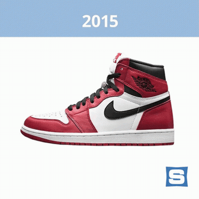 A Pair Of Red And White Nike Shoes With The Year 2015 On The Bottom GIF