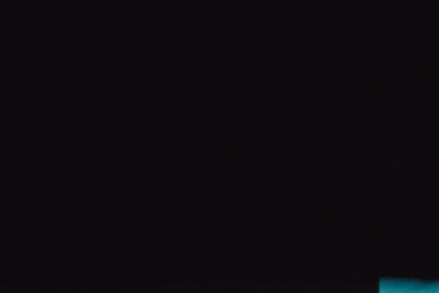 A Pair Of Red White And Black Nike Basketball Shoes GIF