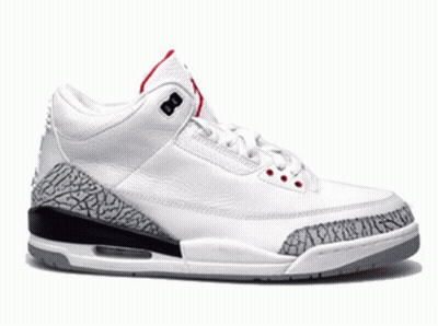 A Pair Of Yellow And Black Nike Air Jordan Shoes GIF