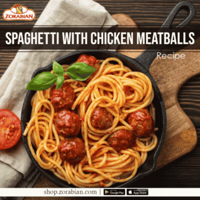 A Pan Of Spaghetti With Chicken Meatballs On A Table GIF