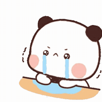 A Panda Bear Is Crying While Sitting On A Table . GIF