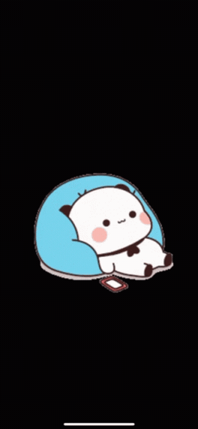 A Panda Bear Is Laying On A Blue Pillow On A Black Background . GIF