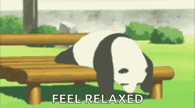 A Panda Bear Is Laying On A Wooden Bench With The Words `` Feel Relaxed '' Above It . GIF