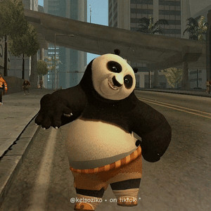 A Panda Bear Is Walking Down A Street With A Caption That Says " Kelsoziko On Tiktok " GIF