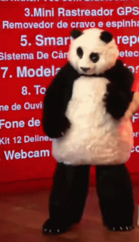 A Panda Bear Mascot Stands In Front Of A Red Sign That Says Mini Rastreador Gps Removedor De Cravo E Espinha GIF