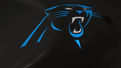 A Panther With Its Mouth Open Is On A Dark Background GIF