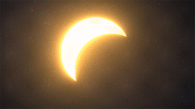 A Partial Eclipse Of The Sun With A Crescent Moon In The Foreground GIF