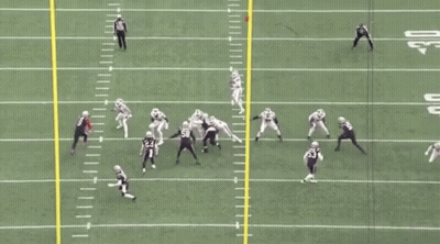 A Patriots Football Game Is Being Played On A Field GIF