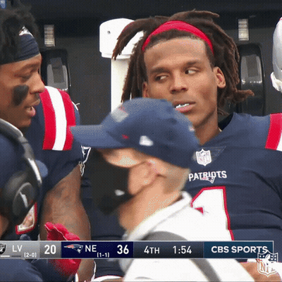 A Patriots Football Player Talking To A Referee During A Game GIF