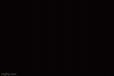 A Pattern Of Red And Black Hexagons On A Black Background GIF