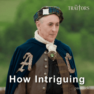 A Peacock Ad For The Traitors Shows A Man In A Cape GIF