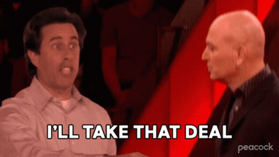 A Peacock Ad Shows Two Men Shaking Hands And Says I 'Ll Take That Deal GIF